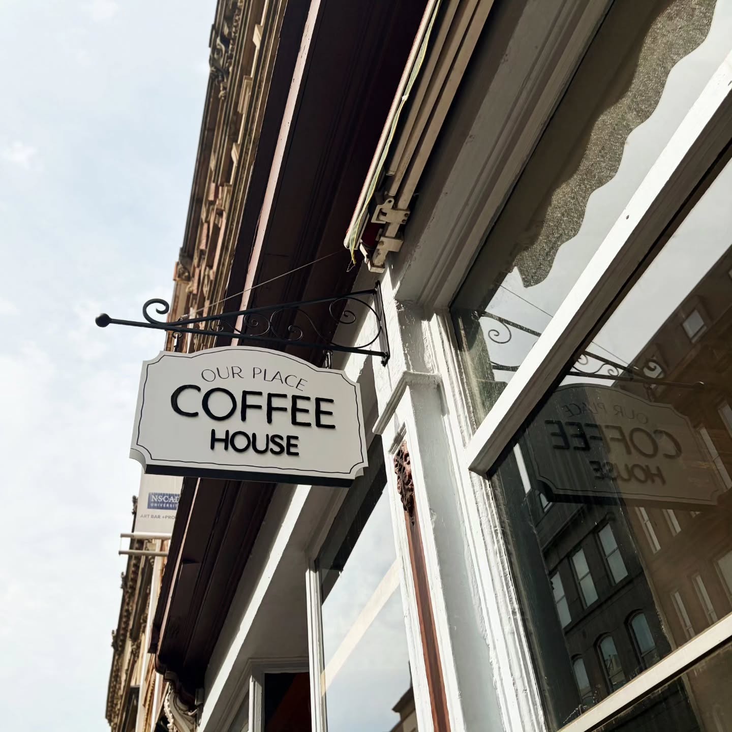 The Our Place Coffee House sign outside on Granville Street